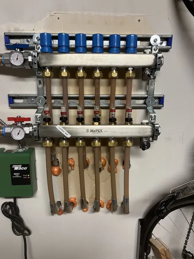 Plumber performing Water Heater Repair at a residential property in Palisades Park